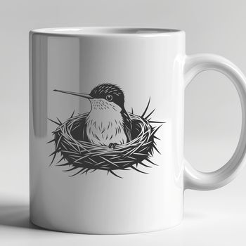 A colorful, iridescent hummingbird perched on a branch, ready for use as vector art in designs.