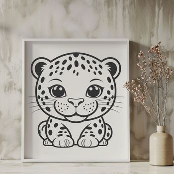 A large cat with spots and a distinctive black rosette-shaped marking on its forehead.