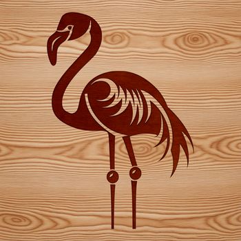 A single flamingo standing on one leg in a savannah-like landscape.