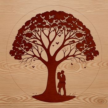 An ornate vector design featuring a tree with heart-shaped leaves and a couple's lips touching in a kiss.