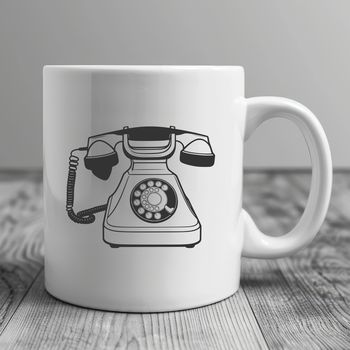 A simple digital telephone with cord and receiver, suitable for graphic design projects.