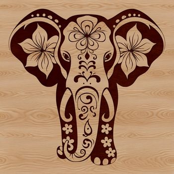 A single elephant standing upright with intricate ornate floral patterns on its body.