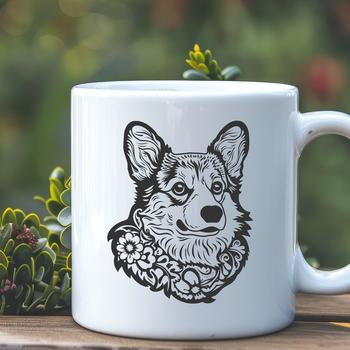 A detailed, hand-drawn design of a friendly Welsh Corgi's head, adorned with ornate floral patterns.
