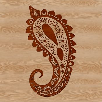 A stylized, ornate paisley shape with intricate patterns.