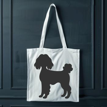 A standing Poodle in full body silhouette.