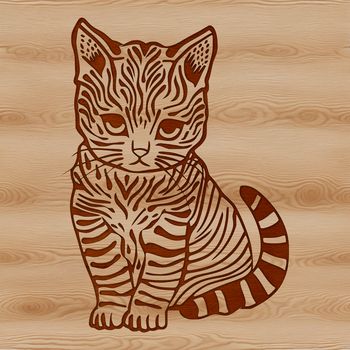A cute kitten sitting on the floor with its paws tucked under its body.