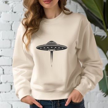 A futuristic spacecraft in outer space with stars and planets in the background.