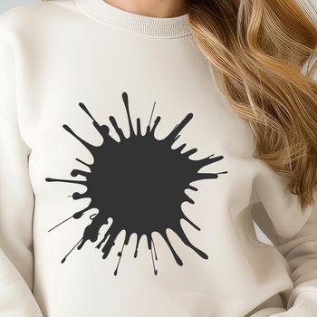 A stylized shape resembling a splat of slime on a flat surface.