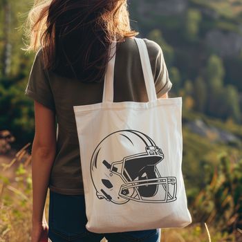 A detailed illustration of a football helmet with an American football on top.