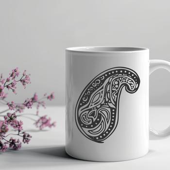 A detailed, ornate paisley shape used as a design element in vector art.