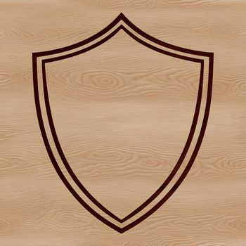 A simple line drawing of a shield with rounded edges and a central emblem.