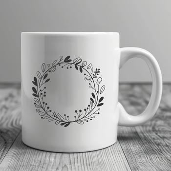 A digital clip art illustration of a decorative floral wreath.