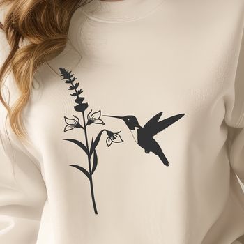 An illustration of a hummingbird surrounded by flowers in mid-air flight.