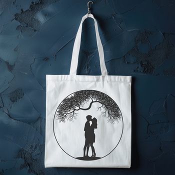 A stylized illustration of a tree with intertwined branches and two people embracing in its trunk.