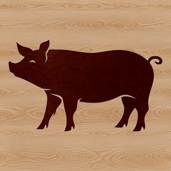 A pig standing on a grassy field with a few trees in the background.