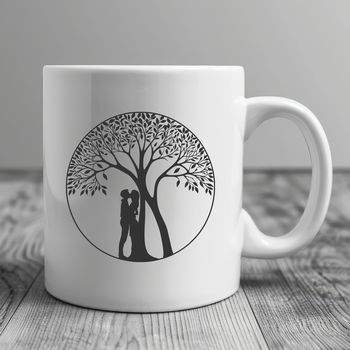 An illustration of a tree with two figures embracing under its branches, symbolizing love and romance.
