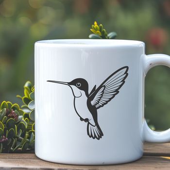 Illustrated hummingbird with vibrant colors and intricate details.