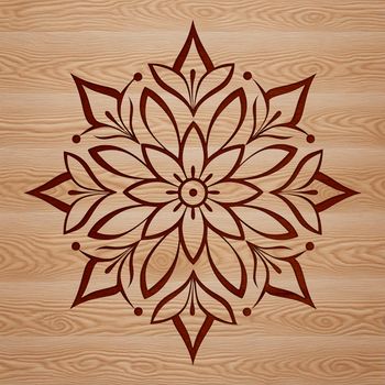 A delicate snowflake design made up of intricate lines and patterns.