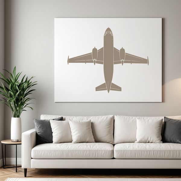 An outline silhouette of a plane against a clear blue sky.