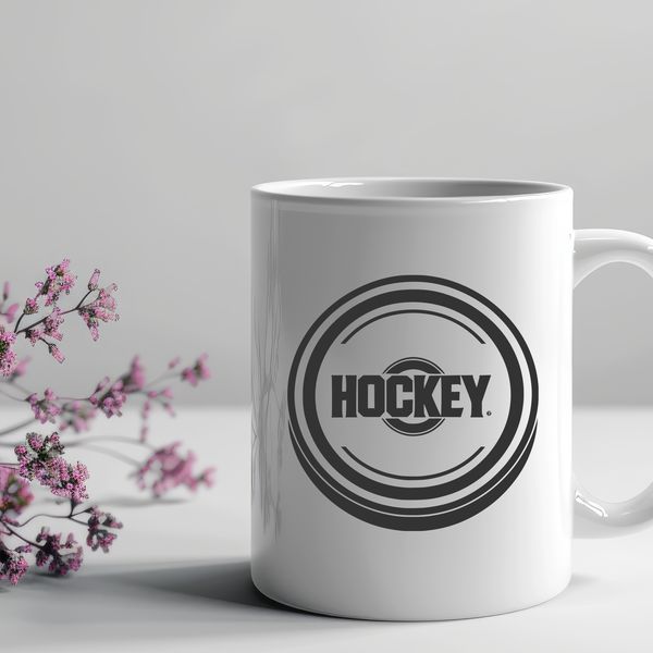 Free Hockey Clip Art A detailed illustration of a hockey puck in mid-air, suitable for vector design and cutting machine templates.