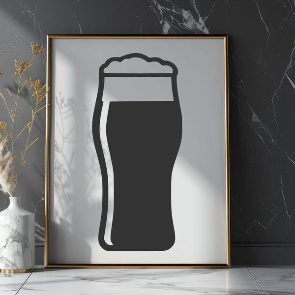 Cold Beer in a Glass A glass containing a cold beer with condensation on the outside.