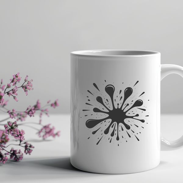 A colorful, irregular shape with splattered details, suitable for vector design projects.
