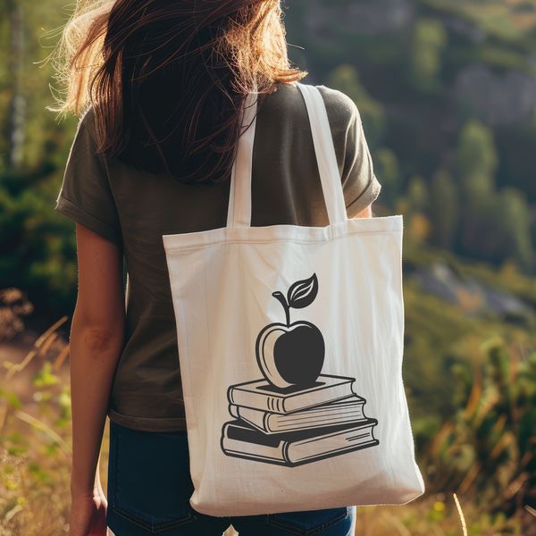 Education Symbol SVG Image A digital illustration of an open book with the Apple logo, suitable for educational resources.