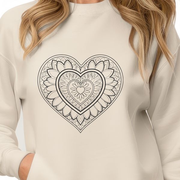 A detailed mandala design featuring a heart shape in various patterns.