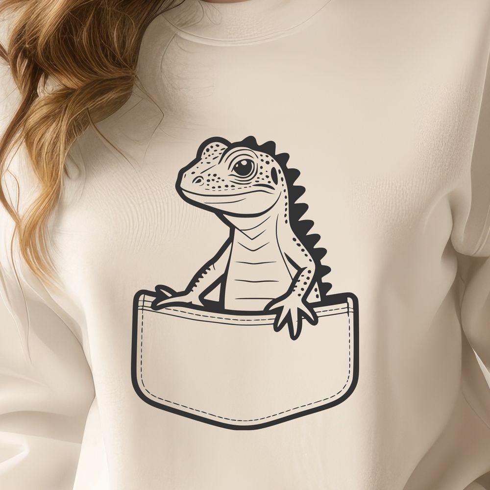 Lizard Peeking Out from Pocket A reptile animal peeking out from behind a small pocket.