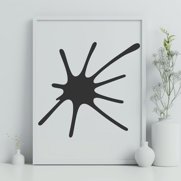 Splattered Shape A stylized splat shape made up of rounded edges and smooth curves.