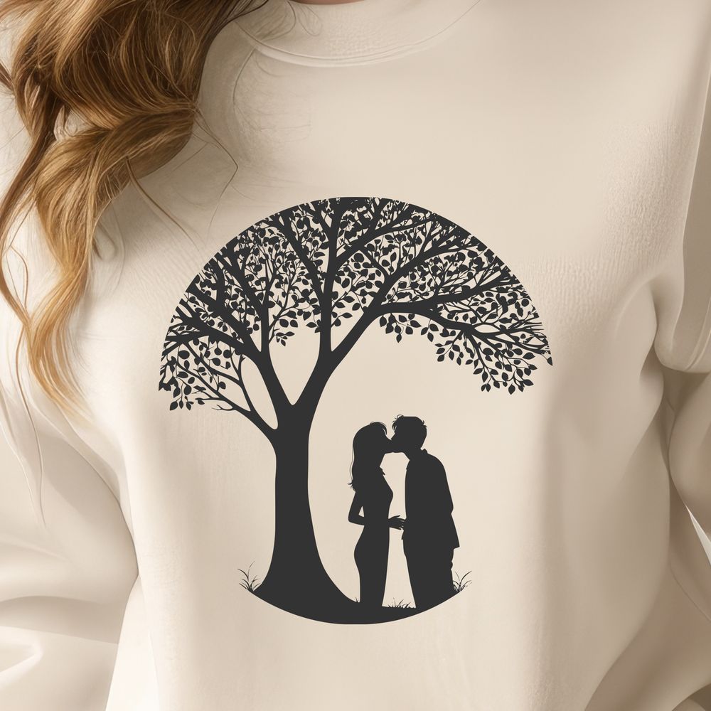 Love Blossoms in this Romantic Scene A pair of figures embracing beneath the branches of a tree, ideal for Valentine's Day or wedding decorations.