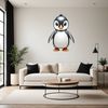 A high-resolution transparent PNG image of a cute baby penguin standing on ice, suitable for commercial and personal use.