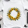 Sunflower Centerpiece for Printing or Digital Use A floral wreath with a single sunflower in the center, suitable for high-resolution printing or digital use.