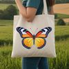 Delicate Butterfly Illustration in PNG Format A colorful, transparent PNG image of a butterfly with clear wings.