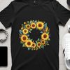 Floral Ring with Bright Blooms A high-resolution floral wreath made up of sunflowers with a clear background.
