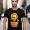Vibrant Sunflower Blooms in a Pot A high-resolution image of a large sunflower plant in a flower pot against a clear background.