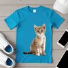 Adorable Domestic Kitten Portrait A small domestic cat with soft fur sits on a surface.