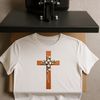 A transparent PNG image of a simple religious cross with a floral design on the front.