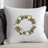 Beautiful Floral Wreath Decoration A floral wreath made up of various flowers and foliage elements.