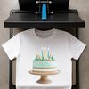 Colorful birthday cake with candles on a clear background, suitable for commercial or personal use in designs and projects.
