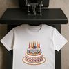 A colorful birthday cake with candles on top in a transparent PNG format.