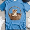 A high-resolution image of a kitten placed in a wicker basket on a transparent background.