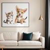 A cute puppy and kitten sitting together on a transparent background for personal or commercial use.