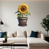 Bright Yellow Blooms in a Decorative Pot A single tall sunflower with bright yellow petals stands proudly in a decorative flower pot on a clear background.
