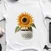 Vibrant Single Sunflower PNG A high-resolution PNG image of a single sunflower standing in a flower pot on a clear background.