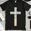 An opaque image of a classic crucifix featuring interlaced floral patterns.
