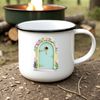 A small, intricately designed door in a whimsical fairy style, perfect for print or digital use.