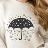 Rainy Day Inspiration: Colorful Umbrella Illustration An illustration of a colorful umbrella with love hearts and raindrops design.