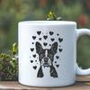 A digital illustration of a cute Boston Terrier dog with heart shapes surrounding its head.