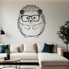 Prickly Friend with Glasses A small, prickly hedgehog character wearing glasses and looking directly at the viewer.
